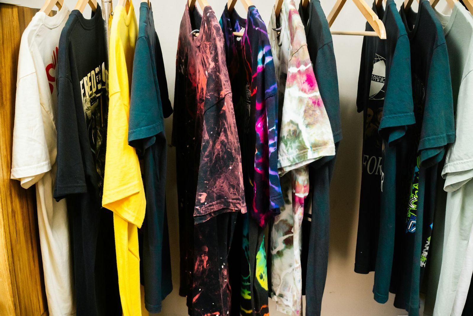 Printed shirts hanging on a rack